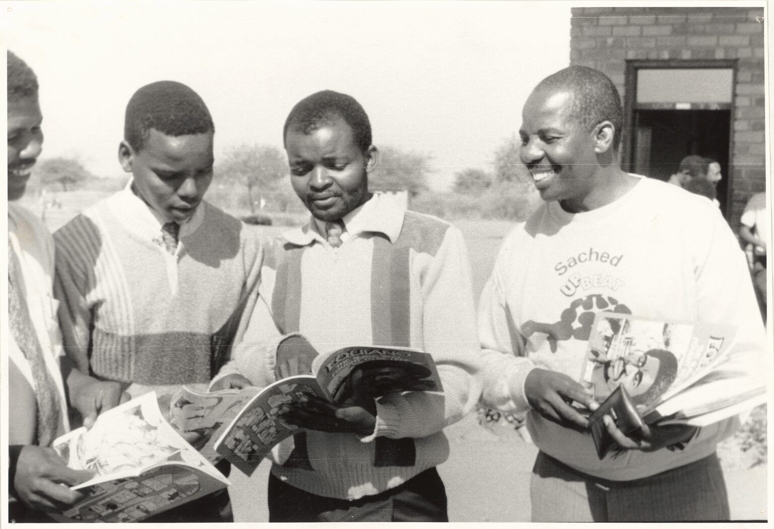 Students reading SACHED materials.
