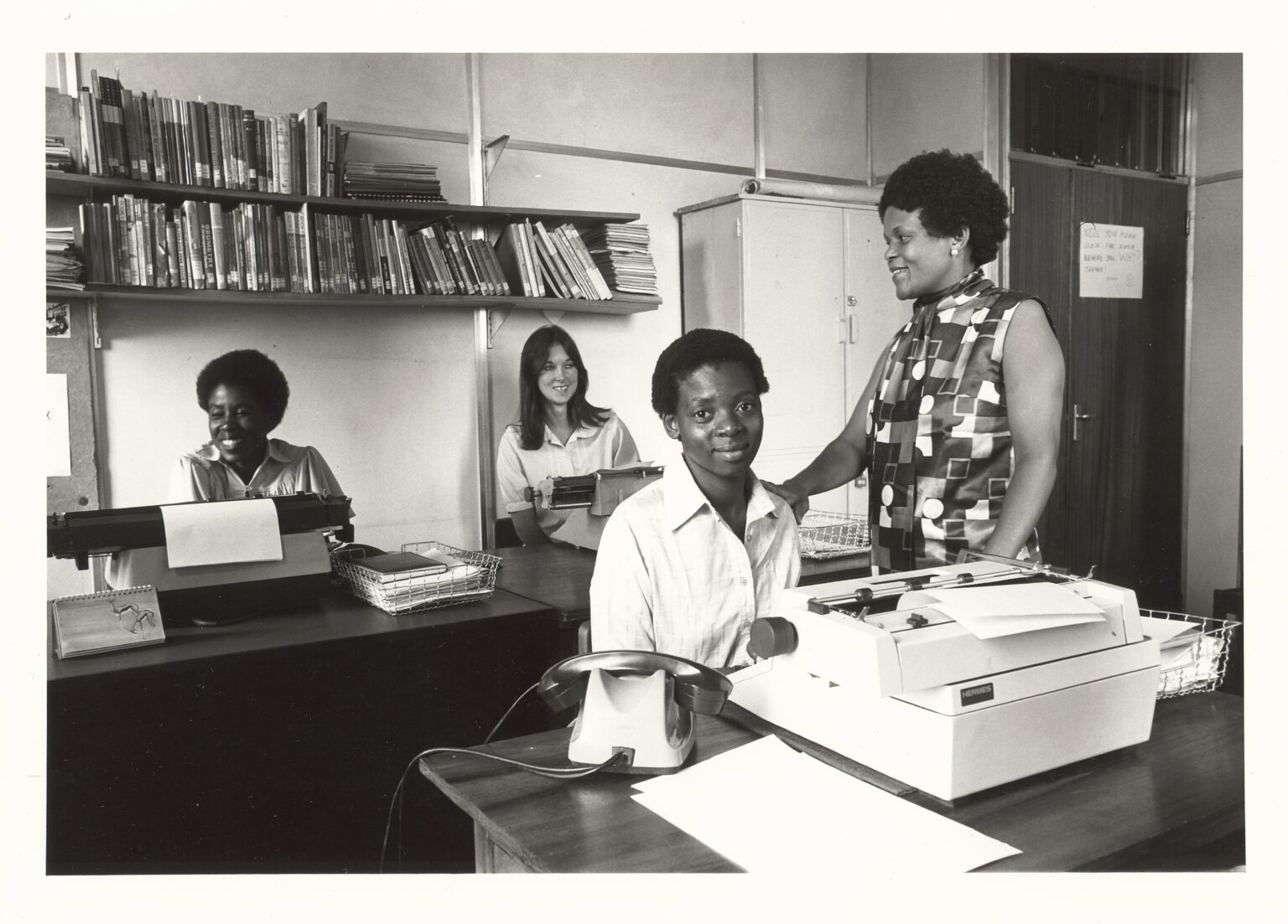 Thakane Mbatha (SACHED) with some typing students (standing).